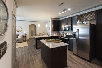 Granite countertops in kitchen & all baths
